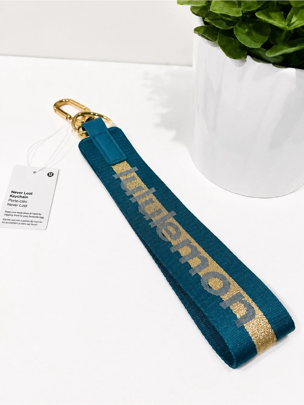 lululemon athletica Teal and Gold Never Lost Keychain Wristlet